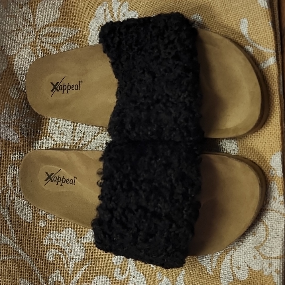 Xappeal slides, new in box.  Black with cork shoebed.  Sz 9.